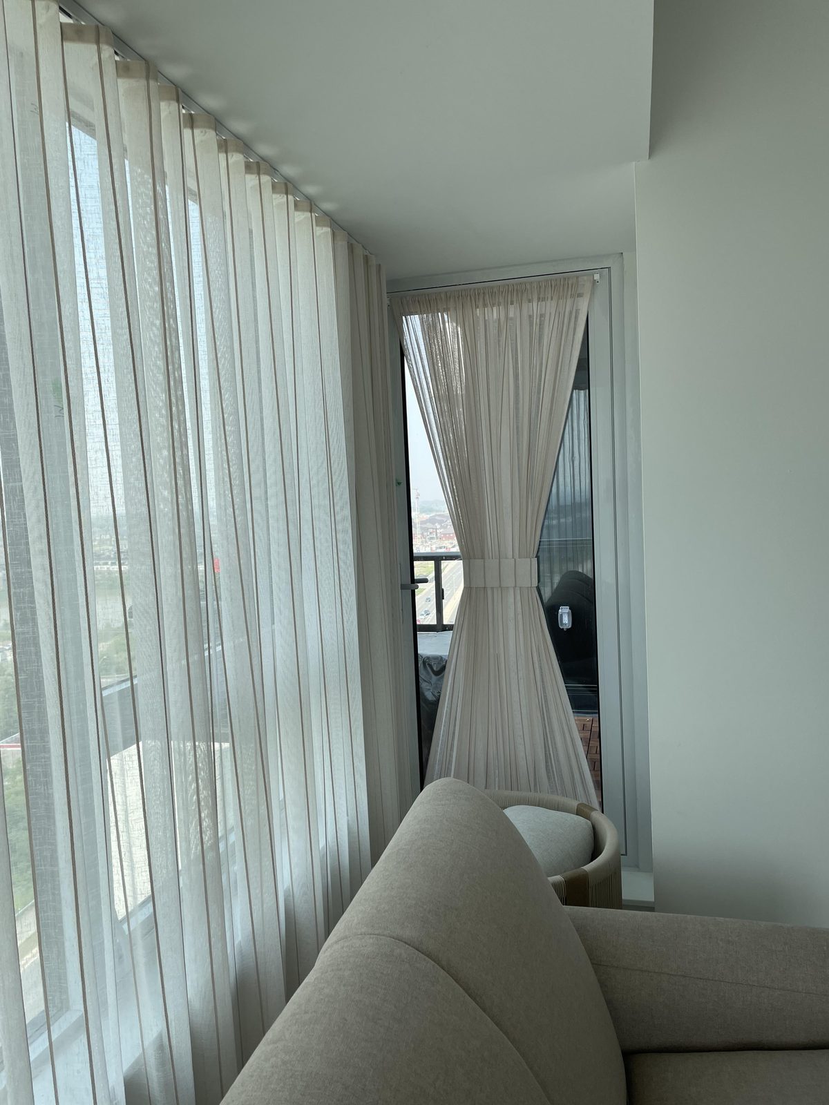 Living room with corner sheers