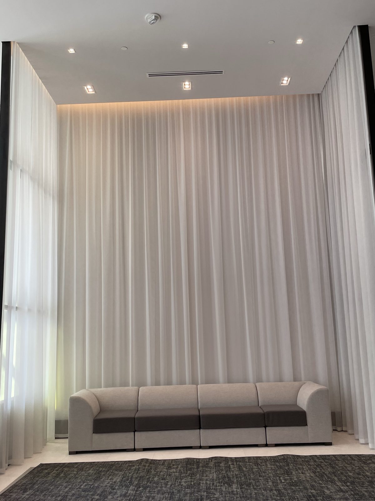 Lounge with double-height sheers