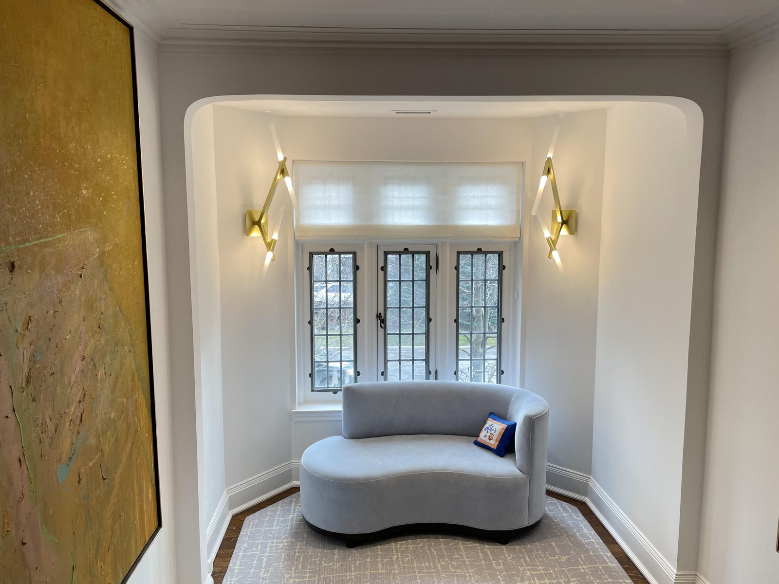 Reading nook with flat roman shade